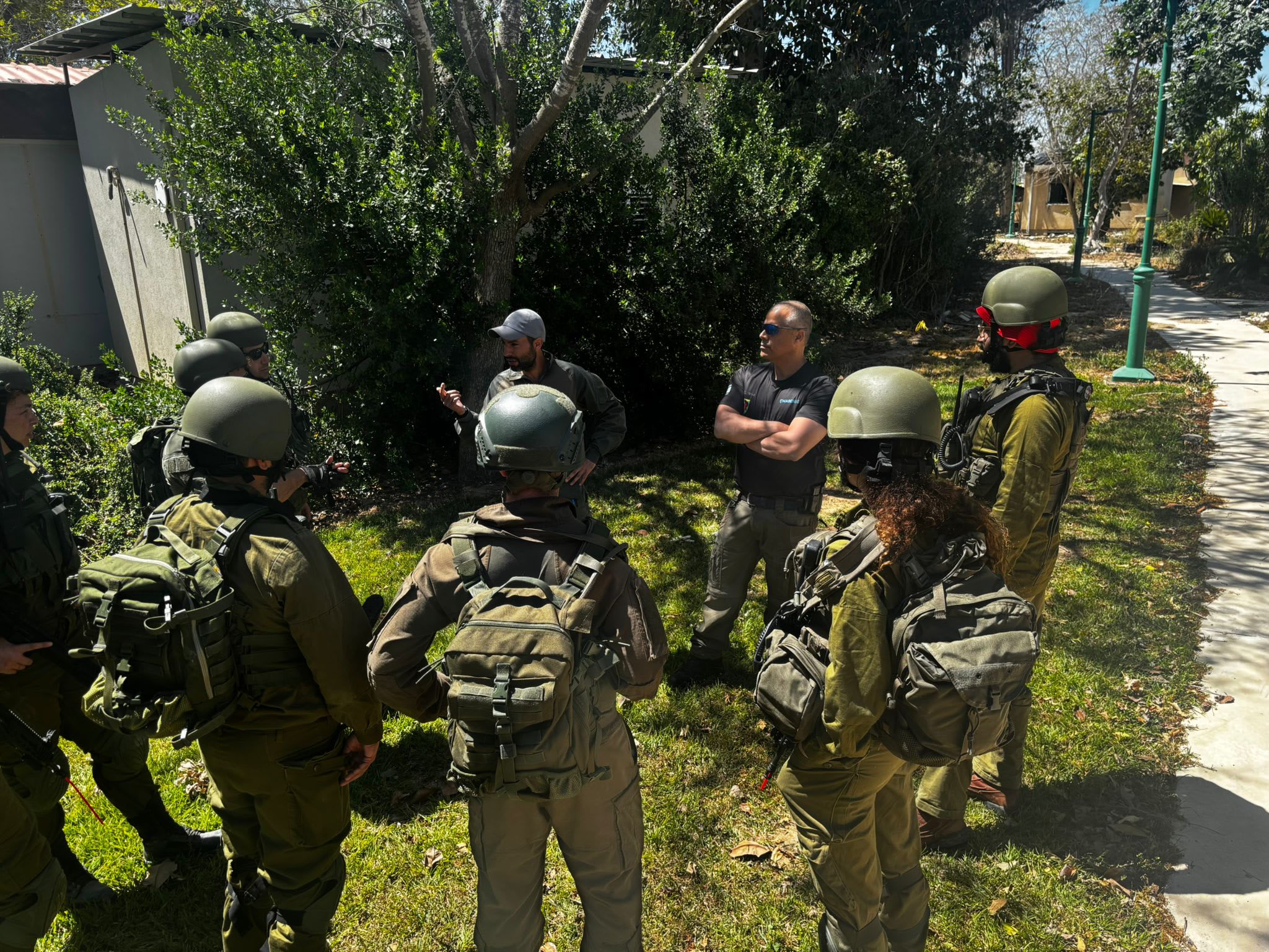 Members of the emergency standby squad in Nir Oz are seen training with Magen 48. (photo credit: SETH J. FRANTZMAN)