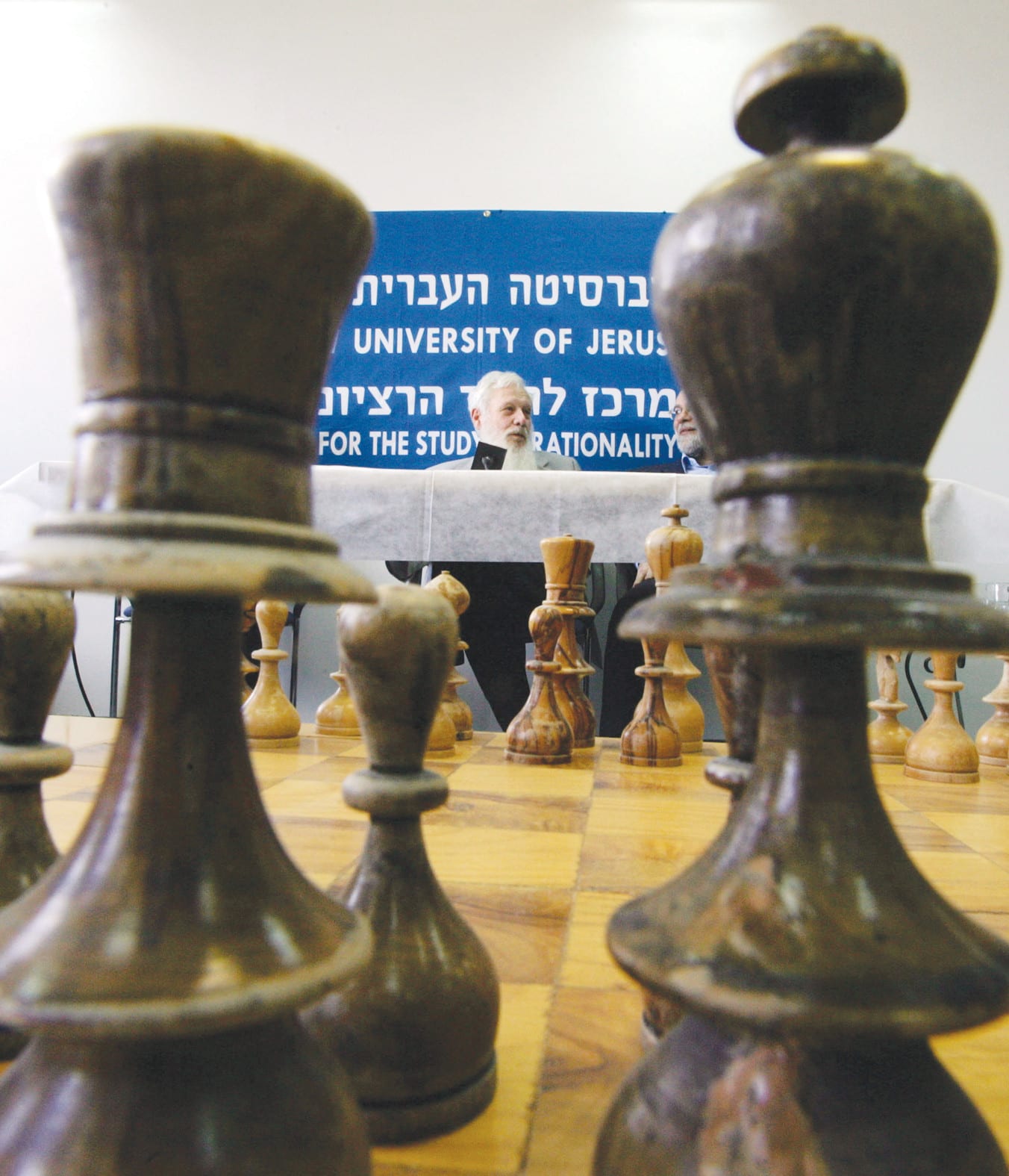 Prof. Yisrael Aumann speaks at a Nov. 2005 news conference at the Hebrew University, after winning the  Nobel Prize in Economics for his work on conflict and cooperation through game theory analysis. He shares the  prize with American economist Thomas Schelling. (photo credit: RONEN ZVULUN/REUTERS)