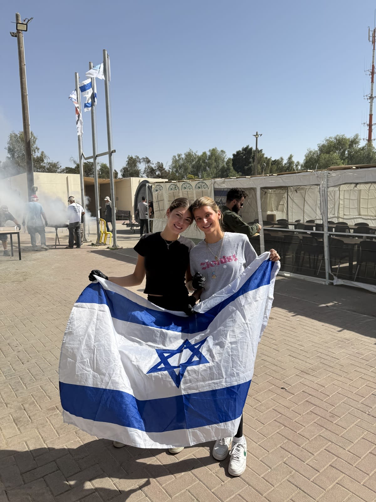 Lily Feinstein and Noa Haron, co-founders of Mini Mitzvahs, at an army base in the south of Israel, 2025. (photo credit: Courtesy Lily Feinstein)