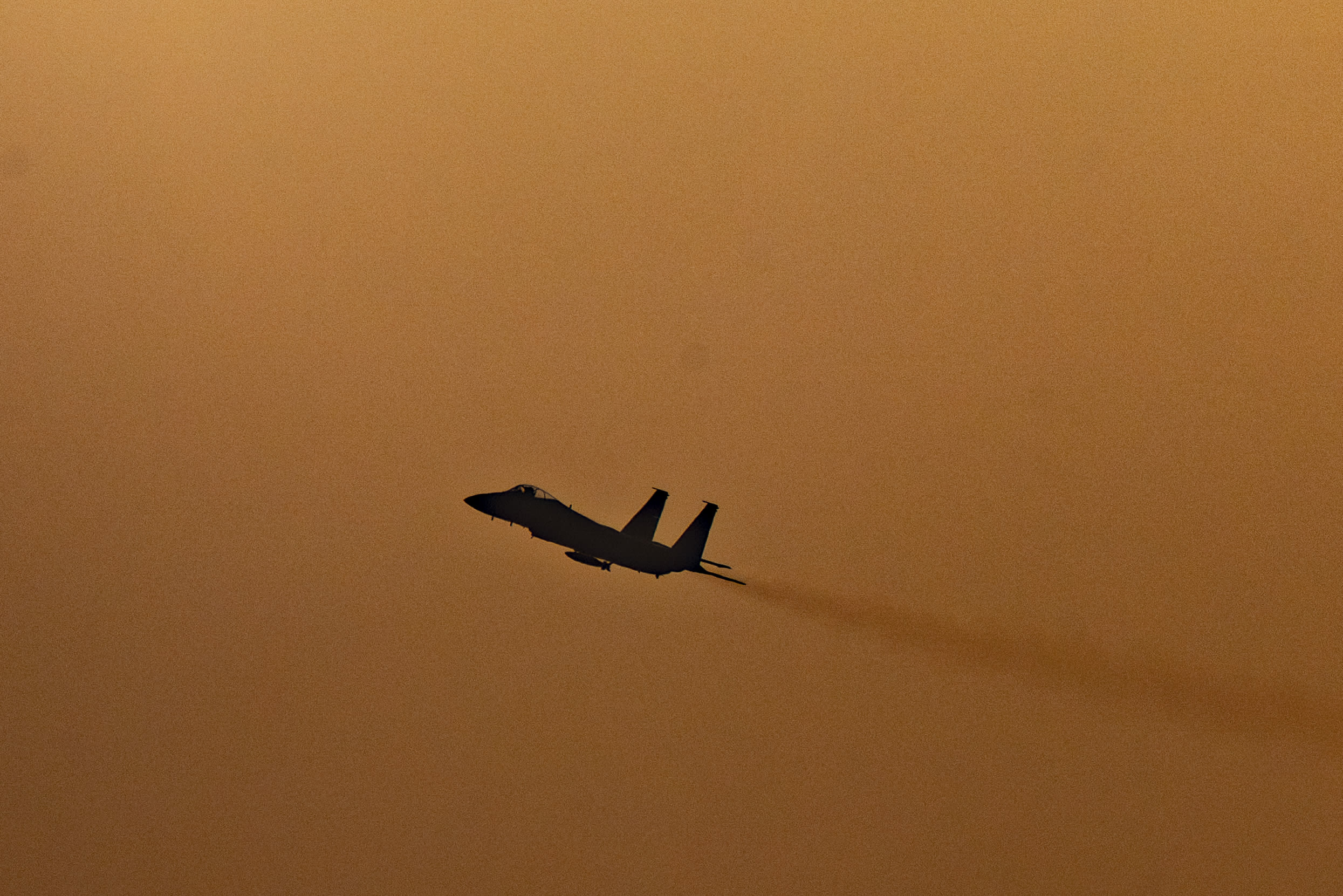 An Israeli Air Force fighter jet flies over central Israel amid the ongoing war between Israel, Iran and Hezbollah, March 12, 2026. (photo credit: NATI SHOHAT/FLASH90)