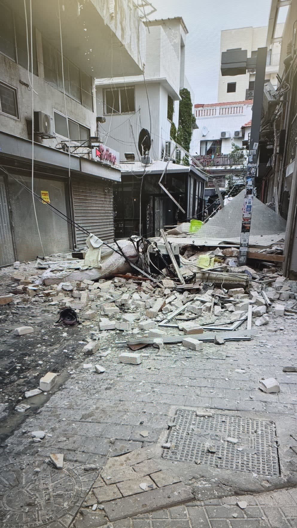 The scene of a collapsed building in Tel Aviv.  (photo credit: WALLA)
