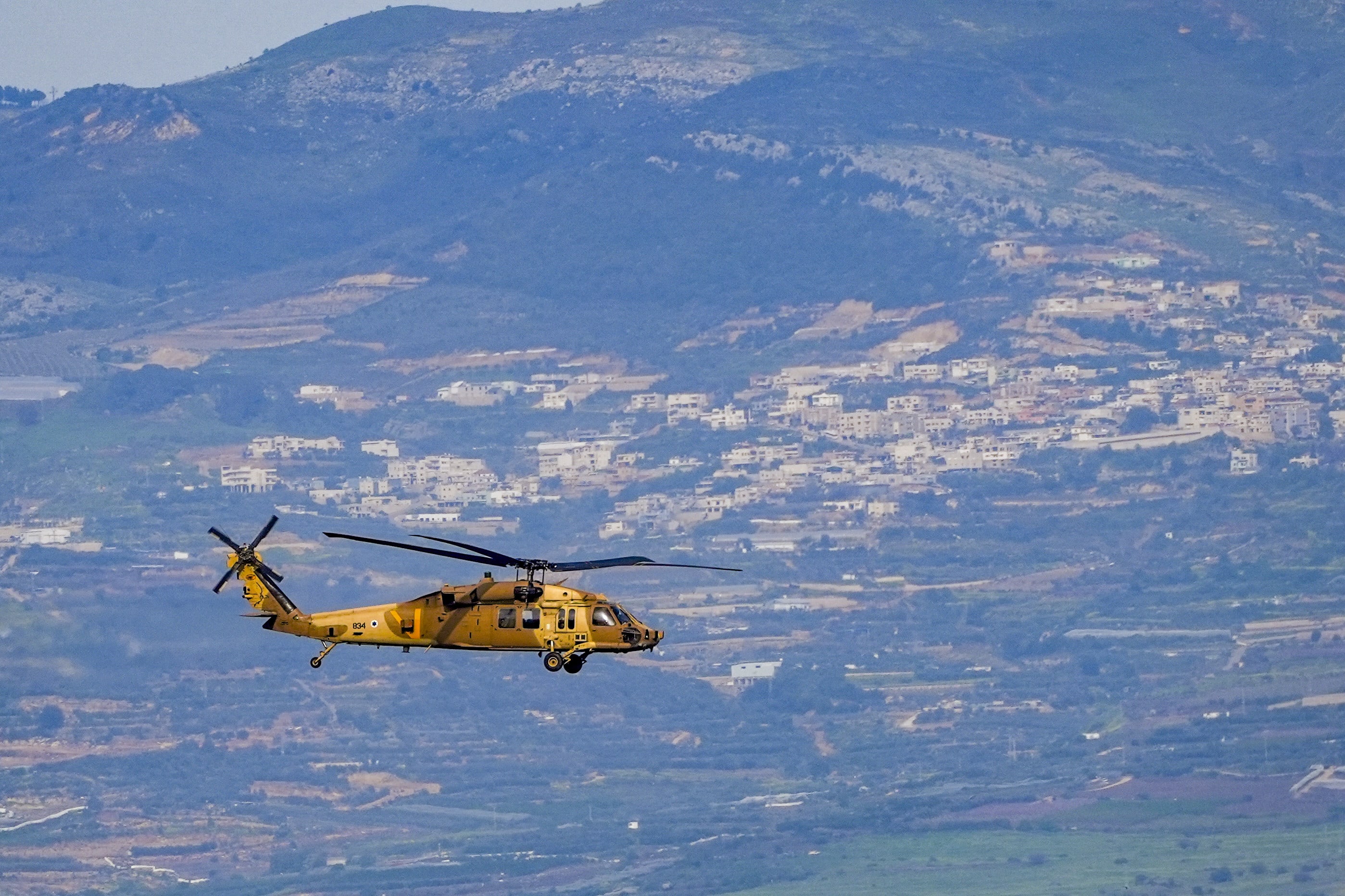 An Israeli military helicopter flies near the Israeli border with Lebanon, during the war with Iran and Hezbollah and ongoing missile fire toward Israel, March 28, 2026. (photo credit: AYAL MARGOLIN/FLASH90)