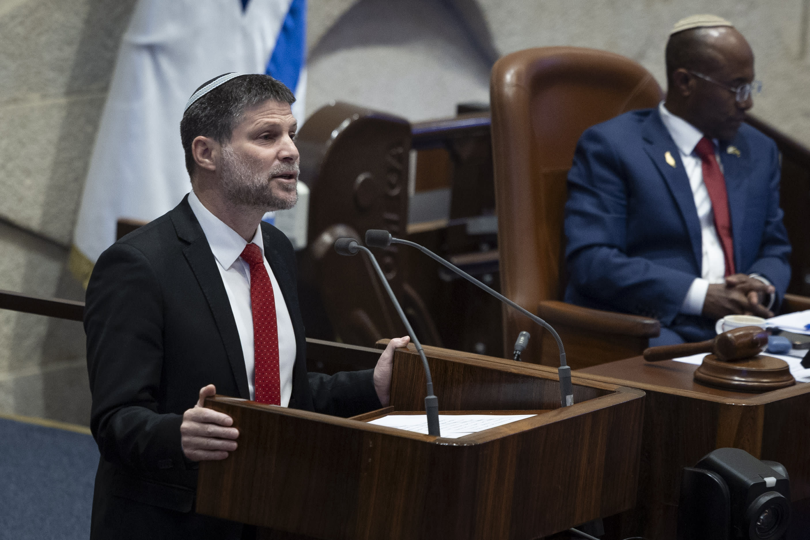 Minister of Finance Bezalel Smotrich speaks during a vote on the state budget at the assembly hall of the Knesset, the Israeli parliament in Jerusalem, January 28, 2026. (photo credit: OREN BEN HAKOON/FLASH90)