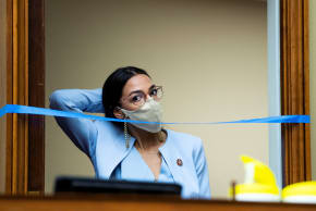 Rep. Alexandria Ocasio-Cortez, D-NY, arrives as Postmaster General Louis DeJoy testifies during the House Oversight and Reform Committee hearing on Monday, August 24, 2020.