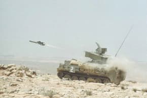 A TAMMUZ MISSILE launched from an IDF tank.