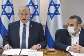  PRIME MINISTER NAFTALI BENNETT speaks at the corona cabinet meeting on Saturday night in Tel Aviv.