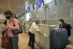  PASSENGERS CHECK IN at Ben-Gurion Airport. We all need to be on the lookout for phishing or fake emails or messages to trick people into falling for a scam.