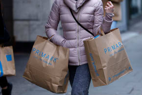  A woman carries Primark shopping bags on Oxford Street, in London, Britain, January 16, 2023.  (photo credit: REUTERS/PETER NICHOLLS)
