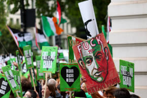 A person holds a sign in protest against Israeli Prime Minister Benjamin Netanyahu, as supporters of Kneecap member Liam O'Hanna, also known as Liam Og O hAnnaidh and performing under the name of Mo Chara, hold placards outside the Westminster Magistrates' Court, in London, Britain, August 20, 2025.