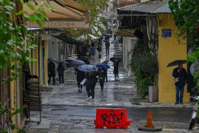 An almost empty tourist area of Plaka is seen on a rainy day in Athens as storm Byron continues to batter large parts of the country December 05, 2025 in Athens, Greece.