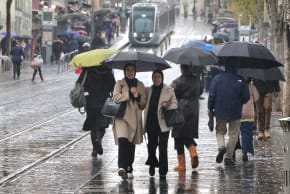 People walking in the rain on Jaffa Road, Jerusalem, December 28, 2025.