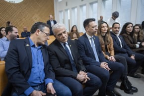 Opposition head Yair Lapid and Yesh Atid MKs arrive for a court hearing at the Supreme Court on a petition against the transfer of funds to ultra-Orthodox educational institutions, January 8, 2026