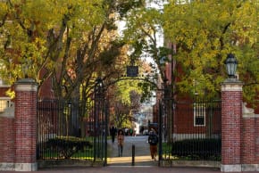 Students walk on campus at Harvard University as it opens a probe into individuals mentioned in the Jeffrey Epstein files recently released by Congress,in Cambridge, Massachusetts, U.S., November 19, 2025.