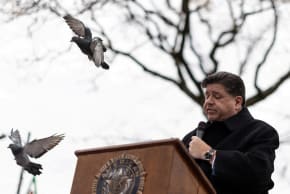 Illinois Governor JB Pritzker pauses as he speaks during a Veterans Day commemoration at the Manuel Perez Jr. Plaza in Chicago, Illinois, U.S., November 11, 2025.