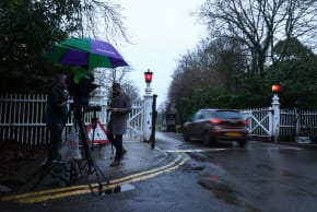   A broadcast media team work as a vehicle enters Windsor Great Park, near Royal Lodge, a property on the estate surrounding Windsor Castle, where Andrew Mountbatten-Windsor, the younger brother of Britain's King Charles, resides, in Windsor, Britain, February 2, 2026. 