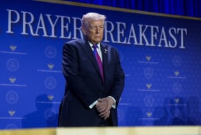 US President Donald Trump prays during a group prayer during the National Prayer Breakfast in Washington, DC, US, February 5, 2026.