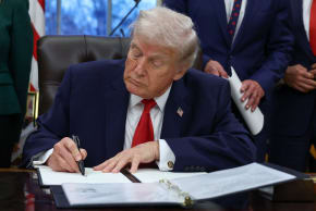 US President Donald Trump signs an executive order for the "Great American Recovery Initiative" to coordinate a federal government response to drug addiction and substance abuse, in the Oval Office of the White House in Washington, DC, January 29, 2026. 
