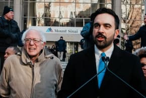 NYC Mayor Zohran Mamdani delivers a speech to members of the New York State Nurses Association union, next to U.S. Senator Bernie Sanders (I-VT), during a picket outside Mount Sinai West in New York City, U.S., January 20, 2026.