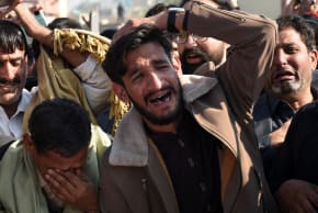 People mourn as they attend a funeral for victims following the suicide explosion at a Shi'ite Muslim mosque, in Islamabad, Pakistan, February 7, 2026. 