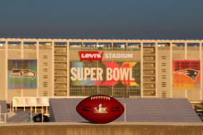  detail view of the Super Bowl LX between the Seattle Seahawks and the New England Patriots logo on a game ball with Levi's Stadium in the background prior to Super Bowl LX between the Seattle Seahawks and the New England Patriots on February 07, 2026 in Santa Clara, California.