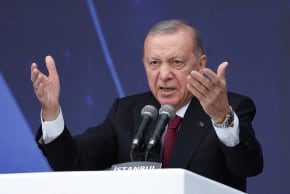 Turkish President Tayyip Erdogan speaks during a ceremony for the handover of new vehicles to the gendarmerie and police forces in Istanbul, Turkey, November 28, 2025.