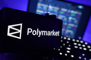 The logo of prediction market trading platform Polymarket is seen on a digital screen (illustrative)