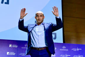 Naftali Bennett speaks during a conference at the Reichman University in Herzliya, on January 22, 2026. 