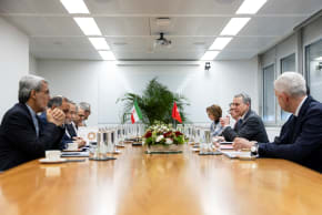 Switzerland's Foreign Minister and Federal Councillor Ignazio Cassis speaks with Iranian Foreign Minister Abbas Araghchi, during a bilateral meeting between Switzerland and Iran, in Geneva, Switzerland, Tuesday, February 17, 2026. 