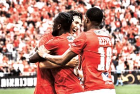 HAPOEL TEL AVIV players are all smiles during their 3-1 victory over Hapoel Jerusalem at Teddy Stadium. 