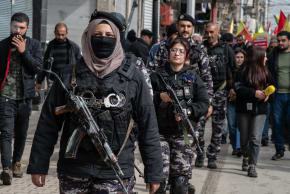 Security for the protest is provided by the local Asayish (Kurdish Police) during a demonstration for Kurdish rights on February 10, 2026 in Qamishli, Syria. The protests called for the protection of Kurdish rights and the achievements of the Rojava revolution as the region