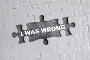 Puzzle with missing pieces, with the words, "I was wrong," in the middle.