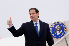 US Secretary of State Marco Rubio gives a thumbs up as he departs at the Liszt Ferenc International Airport in Budapest, Hungary, February 16, 2026.