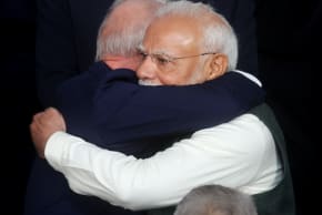 Brazil's President Luiz Inacio Lula da Silva and India's Prime Minister Narendra Modi hug as they gather with leaders of the BRICS group for the family photo during the BRICS Summit in Rio de Janeiro, Brazil July 7, 2025.