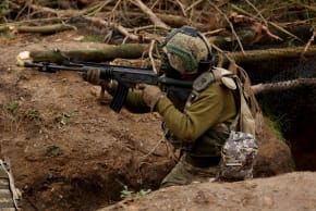 A Ukrainian soldier takes part in a final tactical exercise on the fourth anniversary of Russia's full-scale invasion of Ukraine, held at a British Army training camp in East Anglia, Britain, February 24, 2026.