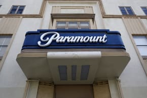 The Paramount logo is displayed above an entrance to Paramount Studios on February 23, 2026 in Los Angeles, California.