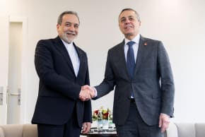 Iranian Foreign Minister Abbas Araghchi (L) meets with his Swiss counterpart in Geneva, February 17, 2026; illustrative.