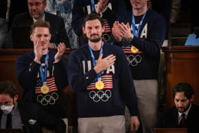 Connor Hellebuyck and other members of the U.S. Menâs Hockey team receive a standing ovation as President Donald Trump delivers his State of the Union address to a joint session of Congress in the chambers of the U.S. House of Representatives in Washington, DC on February 24, 2026.