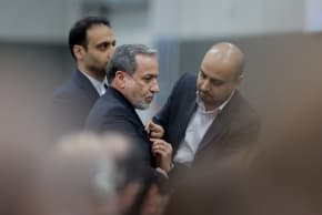Iran's Foreign Minister Abbas Araghchi (C) looks on prior to delivering a speech during a session of the UN Conference on Disarmament, on the sideline of a second round of US-Iranian talks with Washington pushing Tehran to make a deal to limit its nuclear programme, in Geneva, on February 17, 2026.