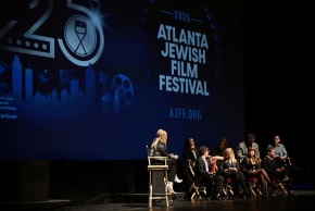 PANELISTS FROM the Atlanta Jewish Film Festival speak onstage. 