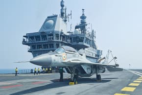 A MIG-29K fighter jet sits on the flight deck of India’s aircraft carrier ‘INS Vikrant’ during the International Fleet Review 2026 off the coast of Visakhapatnam, India.