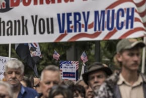 White South Africans supporting US President Donald Trump and South African and US tech billionaire Elon Musk gather in front of the US Embassy in Pretoria, on February 15, 2025 for a demonstration.