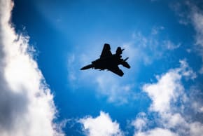 An Israeli Air Force fighter jet flies over central Israel, February 28, 2026