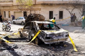 In this picture obtained from Iran's ISNA news agency, yellow tap is rolled out to secure the site where a missile hit a neighborhood, in Tehran on February 28, 2026. 