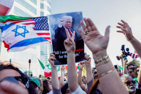 PEOPLE HOLD US, Israeli flags and a poster of U.S. President Donald Trump during a rally against Iran's ruling establishment in Los Angeles, California, US February 28, 2026. 