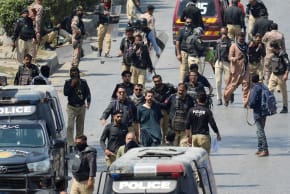 Protesters engage in a clash with security forces outside the US Consulate General, in Karachi, Pakistan March 1, 2026