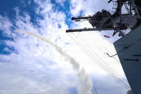 The US Navy Arleigh Burke-class guided-missile destroyer USS Thomas Hudner fires a Tomahawk land attack missile in support of Operation Epic Fury attack on Iran from an undisclosed location March 1, 2026.