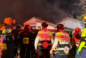 Magen David Adom medical teams responding to Iranian ballistic missile impact site in central Israel, March 1, 2026.