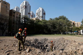 Emergency responders attend the scene of an Iranian missile strike, in Beersheba, southern Israel, March 2, 2026