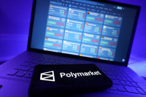 Polymarket Logo And Website With Prediction Market Interface On Computer Screen.