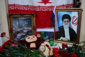 A portrait of late Iran's Supreme Leader Ayatollah Ali Khamenei, who was killed in US and Israeli strikes on Saturday, stands among flowers and toys outside the Iranian Embassy in Moscow, Russia March 1, 2026.